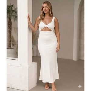 Petal & Pup Cream Cutout Midi Dress. Does not fit the hips. Reposhing.